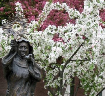 St.-Clare-statue-flowers
