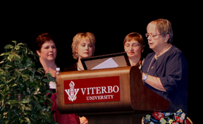 St. Anthony Nursing Home reps receive the Christian Mission Award for the Bucket List Program from Sister Jean Moore