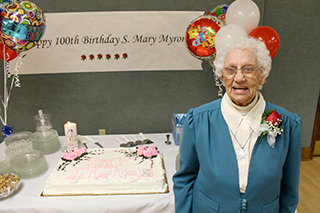 Sister Mary Myron with cake