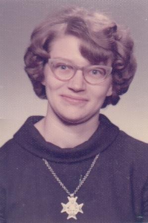 woman-glasses-brown-hair-medal