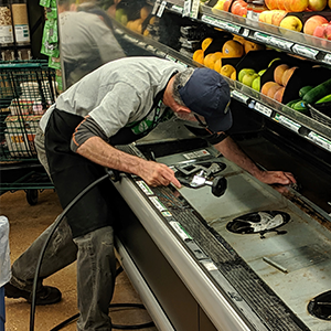 FSPA Affiliate Tim Sullivan working at People's Food Co-op