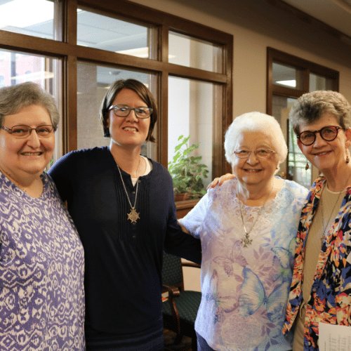 Sister Michele poses with Sisters Deb, Joan and Marcia