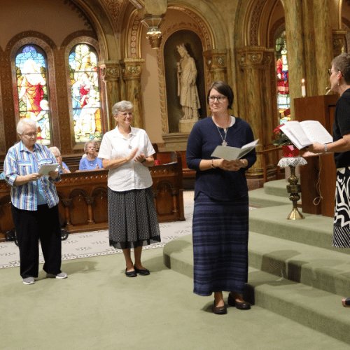 Sister Michele professes final vows in the front of Mary of the Angels with Sisters Lisa, Katie and Sue