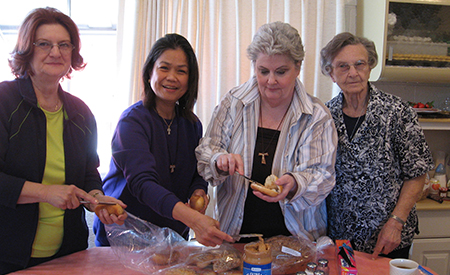 Las Vegas affiliates and Sister Lorraine Forster making sandwiches for homeless