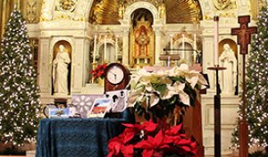 chapel decorated with christmas trees and a display of clocks and calendars