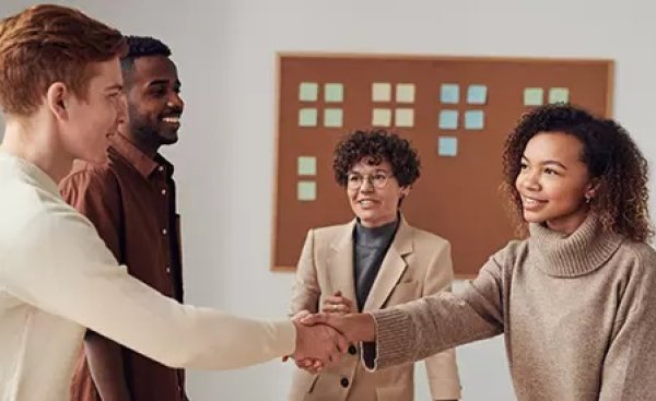 group of people shaking hands