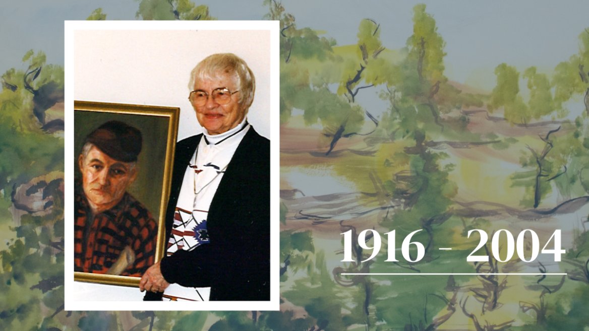 Picture of a woman with short white hair, glasses, white shirt and black sweater holding painting of man with a black hat and black and red checked shirt over a watercolor landscape image