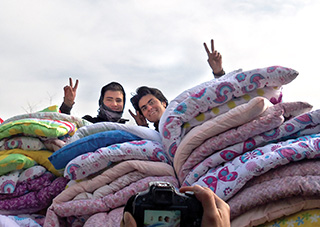 young men with duvets