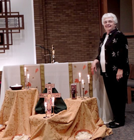 Sister Charlotte Seubert and the Transitus altar display 