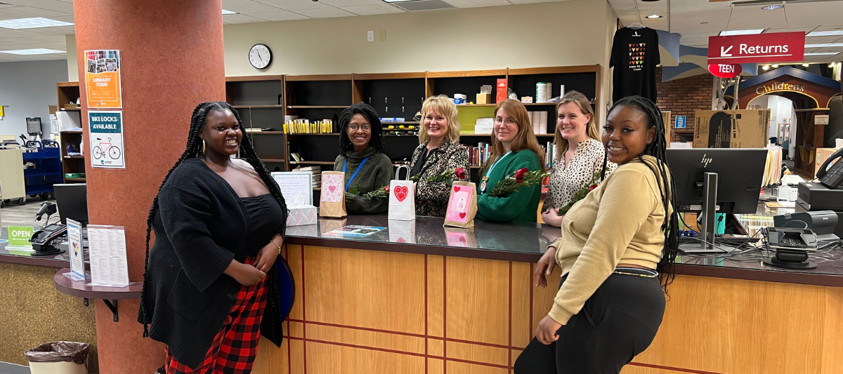 Black Student Leaders present valentines to staff at the La Crosse Public Library