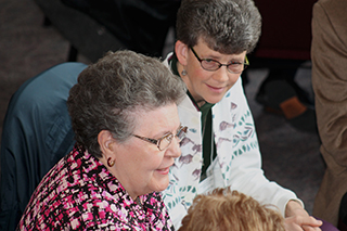 sisters in discussion