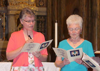 Sister Lauries profess vows standing next to Sister Karen