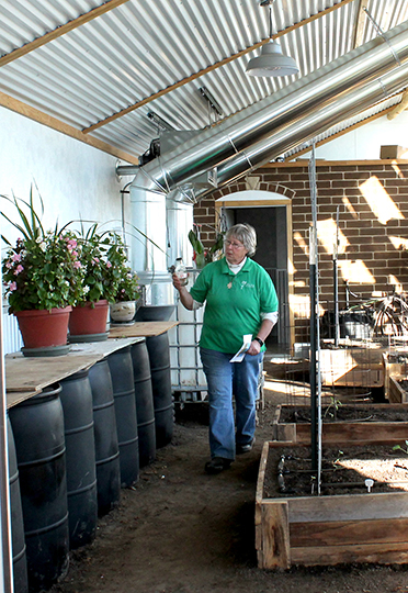 Sister Lucy blessing greenhouse