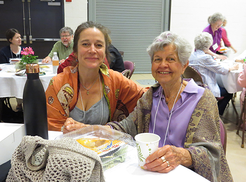 honored guest and Sister Delmarie Gibney smile during a break at A Revolution of Goodness