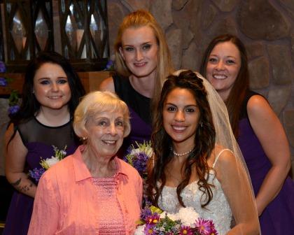 five-women-bride-purple-dresses-peach-dress