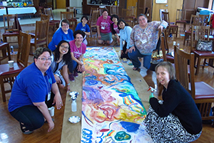 Sister Sarah Hennessey lower-right with women religious at Giving Voice