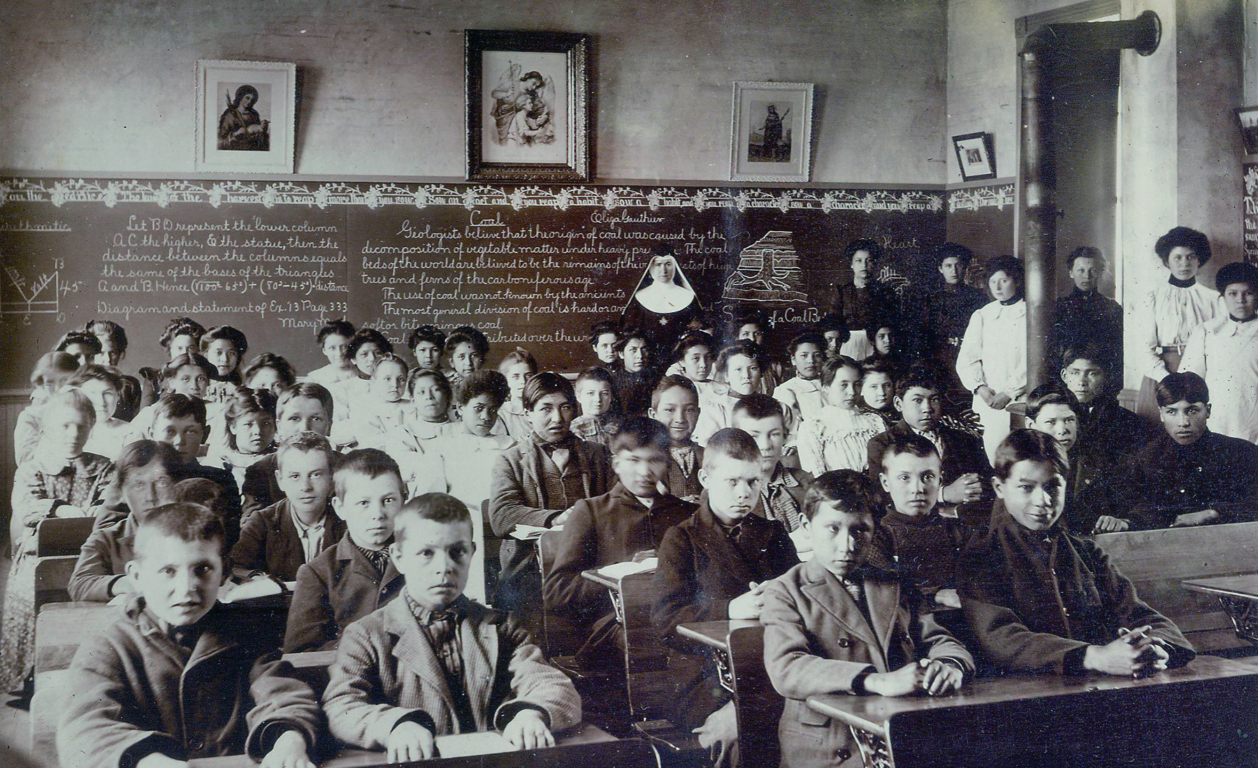 group of students sitting in old classroom